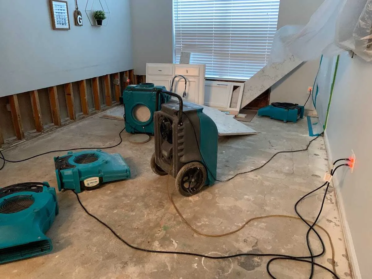 Dehumidifier in flood-cut room for Water Damage Restoration in South Elgin